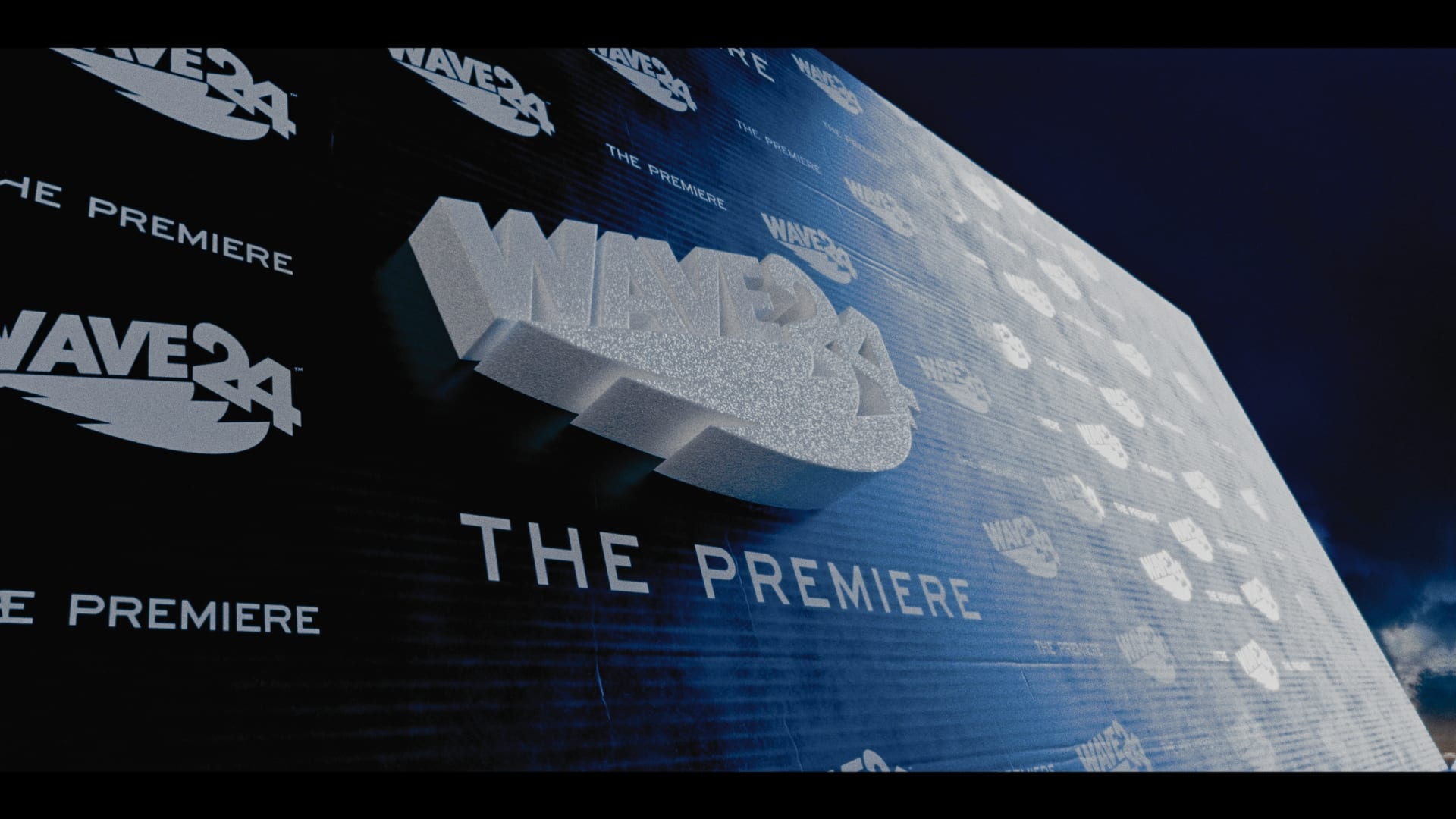 WAVE24 production still — red carpet